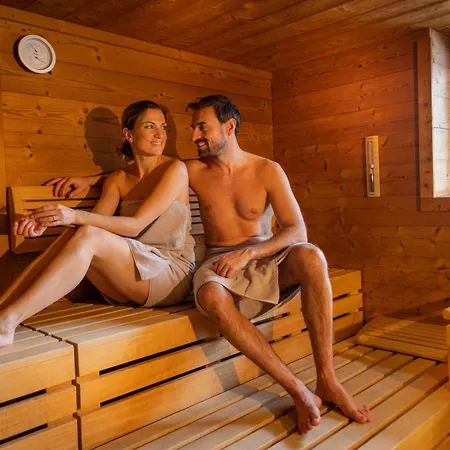Wellness- Und Familienhotel Garni Dachsteinresort Апарт-отель Русбах-ам-Пас-Гшютт