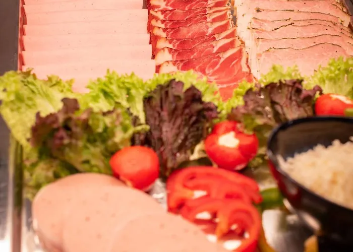 Wellness- Und Garni Dachsteinresort アパートホテル 4*