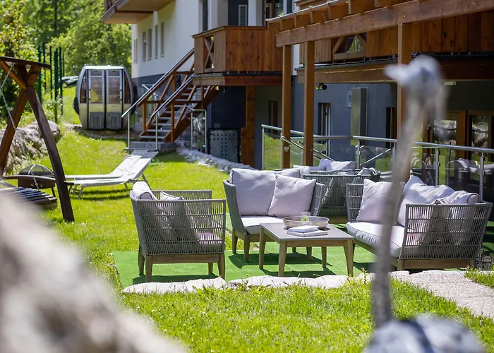 Wellness- Und Garni Dachsteinresort アパートホテル 4*